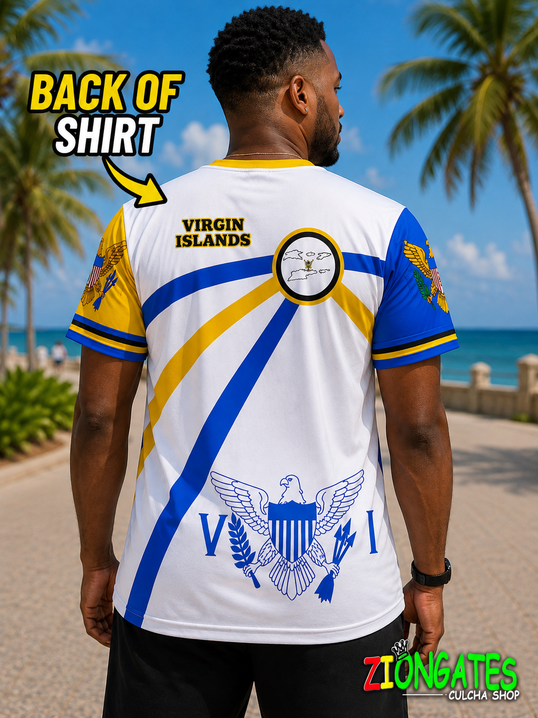 A man shown from the back wearing a Virgin Islands soccer jersey with blue and yellow diagonal stripes, a crest on the upper back, and a large eagle graphic on the lower back. Palm trees and ocean are visible in the background, with text overlays reading 'BACK OF SHIRT' and 'ZIONGATES CULcha SHOP'.