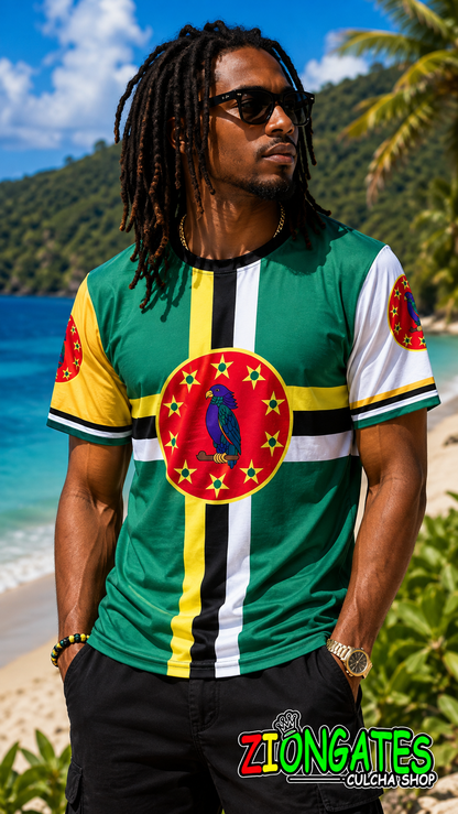 A man wearing a green, yellow, and white Dominica t-shirt with a central red circular emblem, standing on a tropical beach with the ZIONGATES Culcha Shop logo at the bottom.