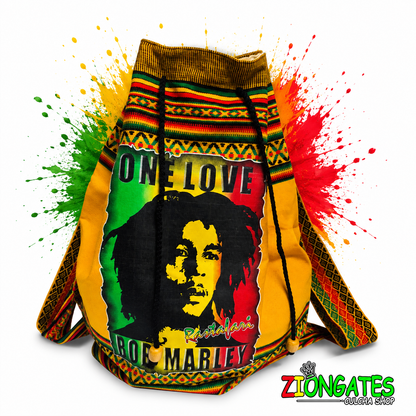 A Rasta-themed drawstring hoodie featuring Bob Marley artwork and 'One Love' text, decorated with vibrant green, yellow, and red paint splatters on a white background. The brand logo 'ZionGates' is visible in the bottom right corner.